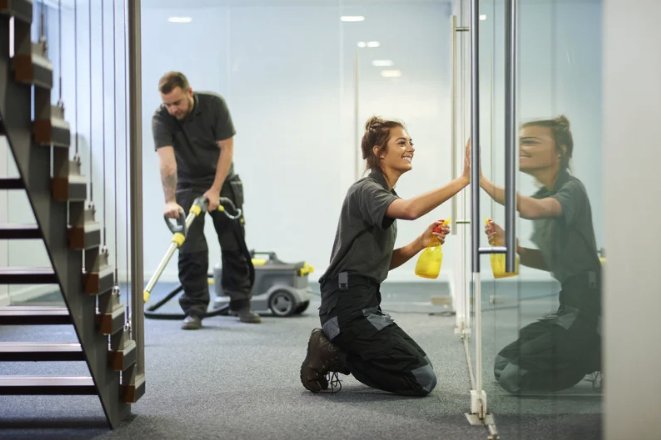 Professional cleaning team at work in a commercial office